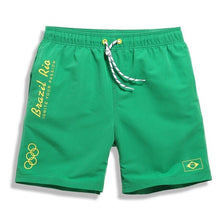 Load image into Gallery viewer, Men's green Board Shorts