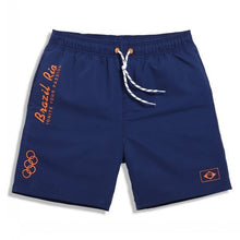 Load image into Gallery viewer, Men's green Board Shorts
